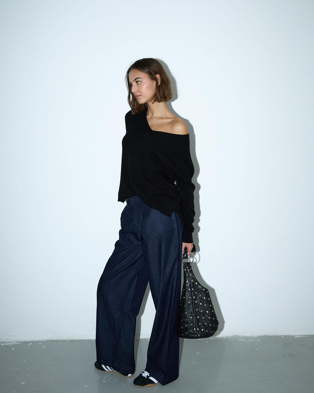 Calça de ganga azul escura de perna larga