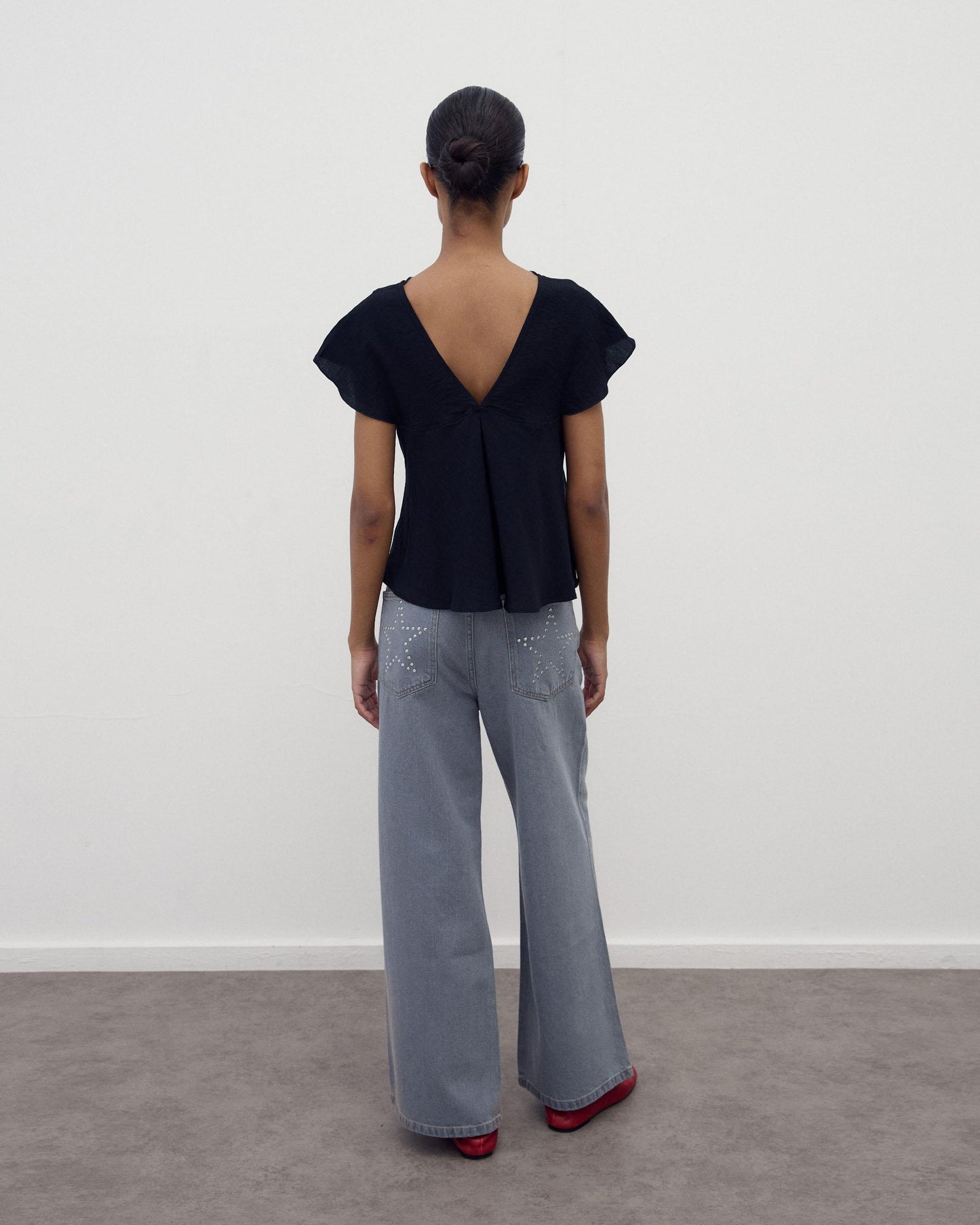 Jeans Tachas Estrelas Cinzento