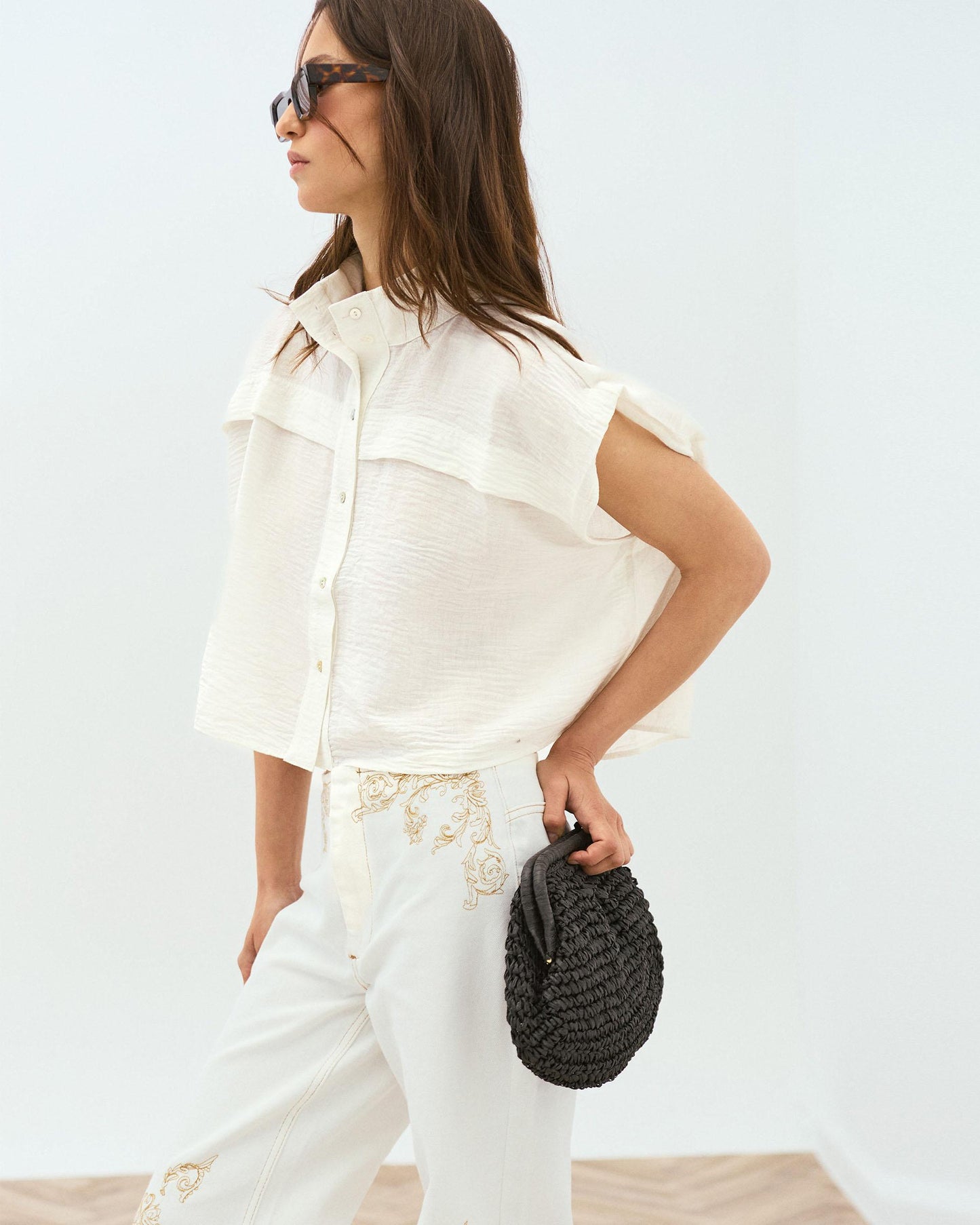 White Sleeveless Blouse with Shoulder Pads