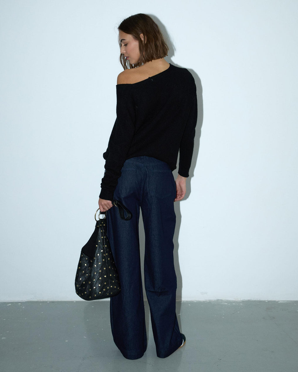 Calça de ganga azul escura de perna larga