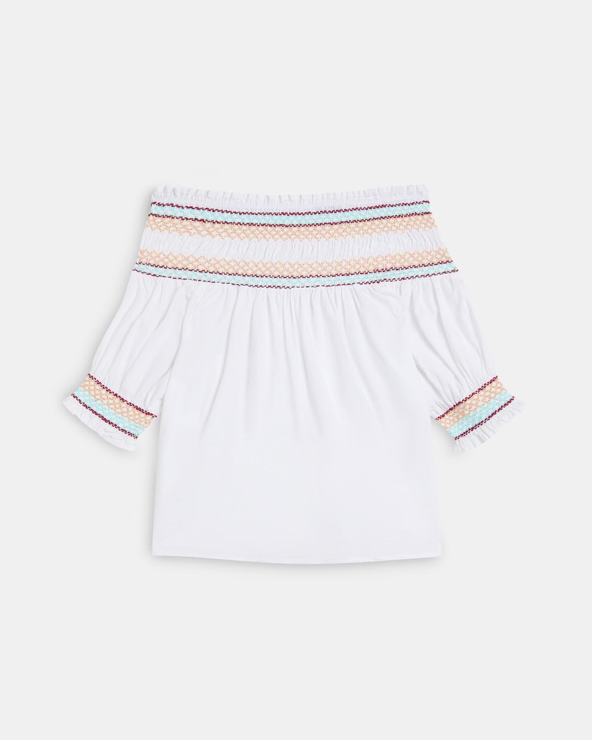 Goma eta brodatudun blusa zuria