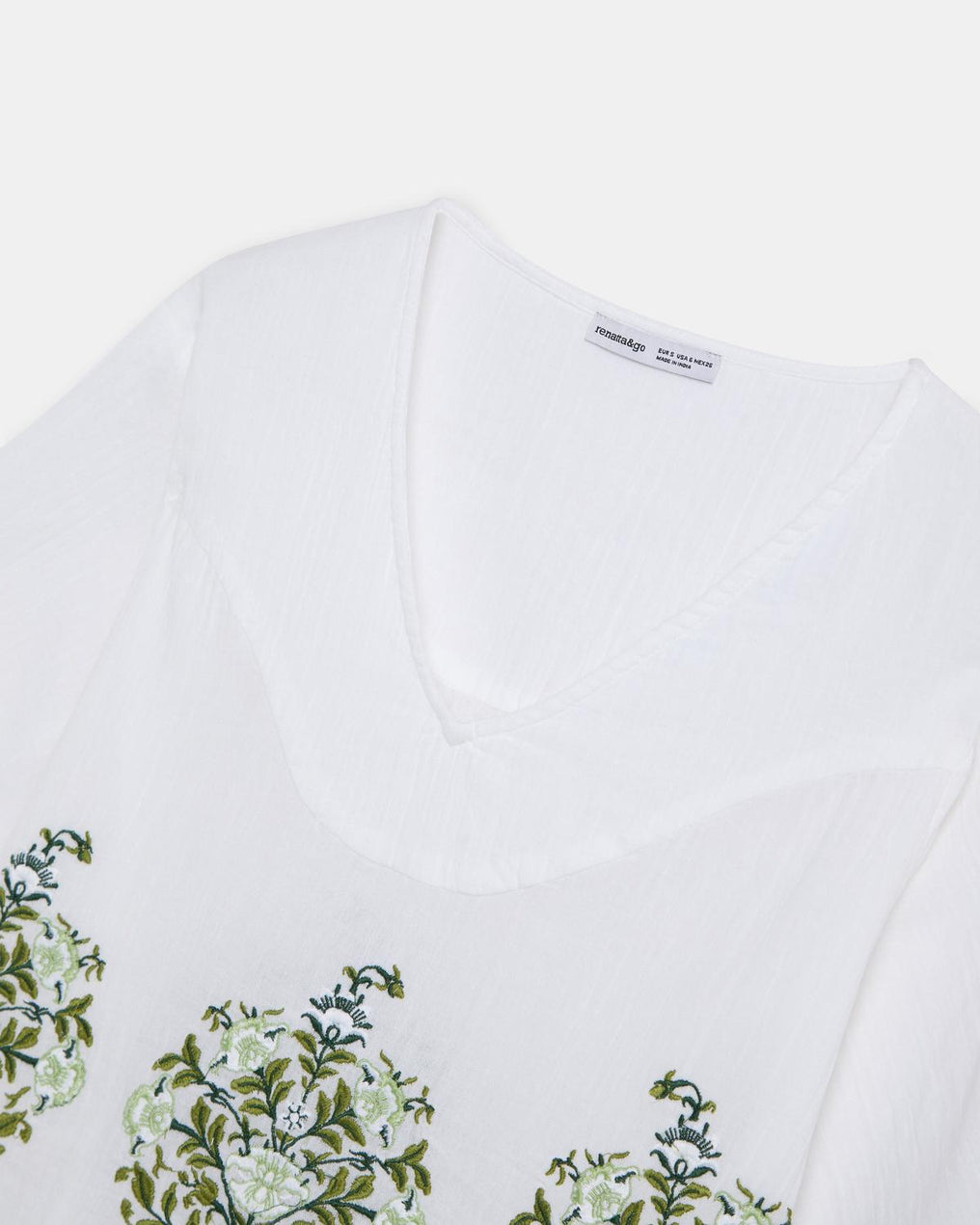 White Blouse with Floral Embroidery and V-Neck Yoke