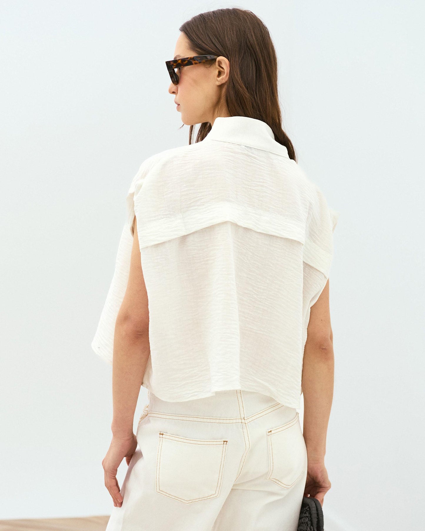 White Sleeveless Blouse with Shoulder Pads