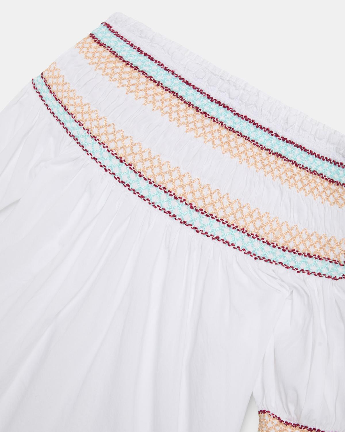 Goma eta brodatudun blusa zuria